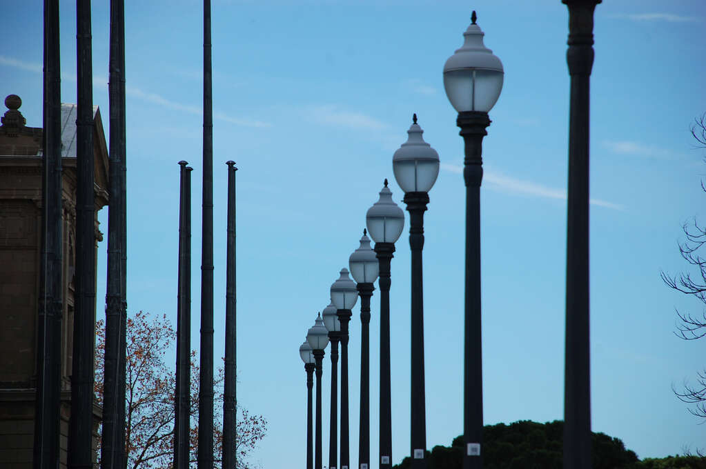 A row of lamp posts leading off into the distance.