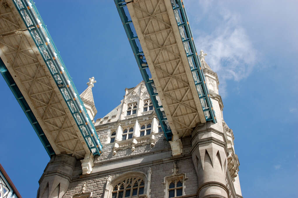 Looking up at the underside of the pedestrian walkways on Tower Bridge.